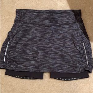 Atleta Women’s Contender running striped Skort